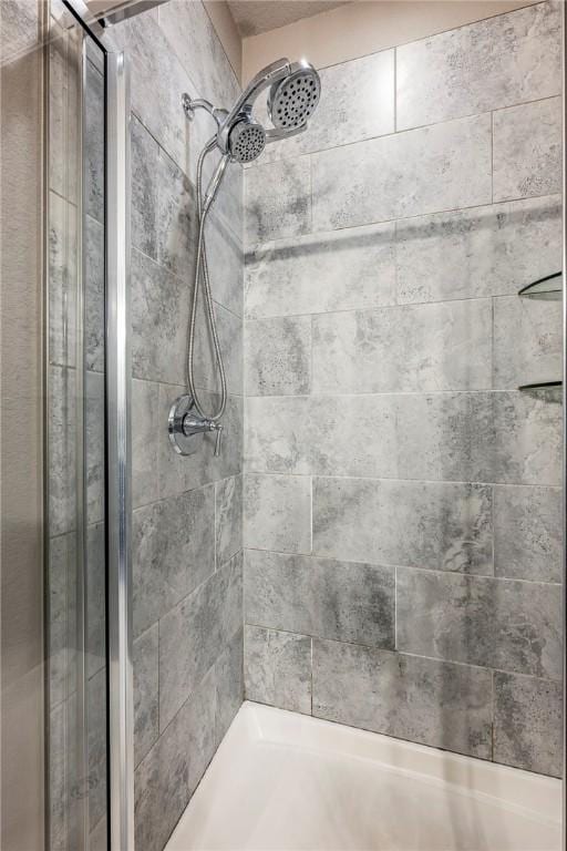 full bathroom with a shower stall