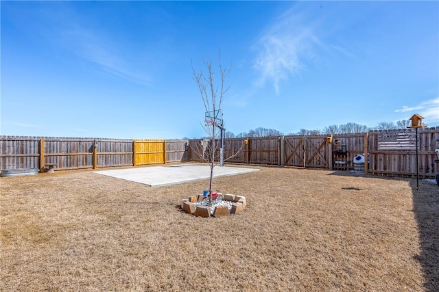 view of yard featuring a fenced backyard and a patio