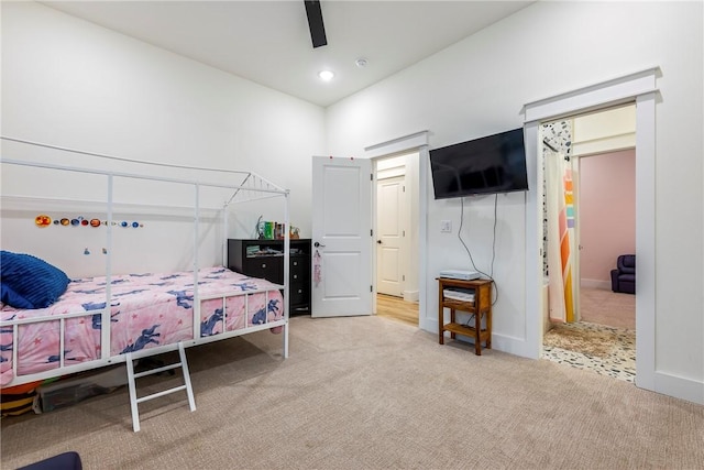 carpeted bedroom featuring baseboards, a ceiling fan, and recessed lighting