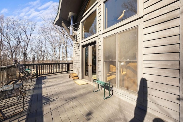 wooden deck featuring french doors