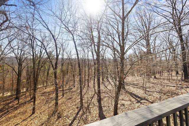 exterior space with a forest view