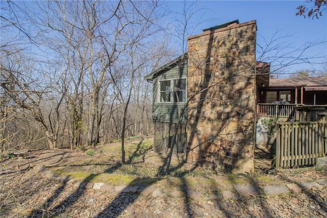 view of home's exterior with a chimney