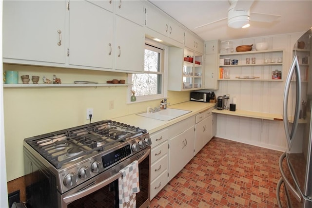 kitchen featuring open shelves, ceiling fan, light countertops, appliances with stainless steel finishes, and white cabinetry