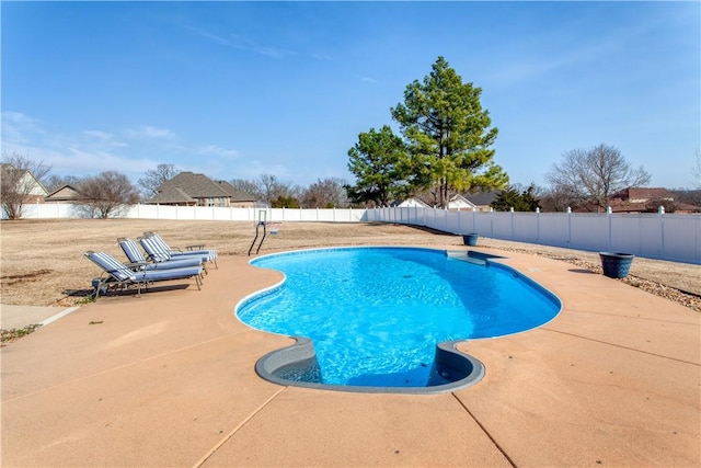 view of pool featuring a fenced in pool, a patio area, and a fenced backyard