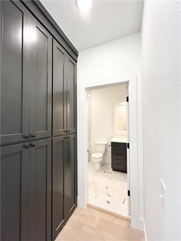 hallway featuring light wood-style floors