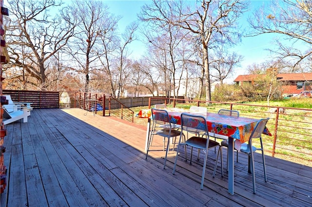 deck featuring outdoor dining space