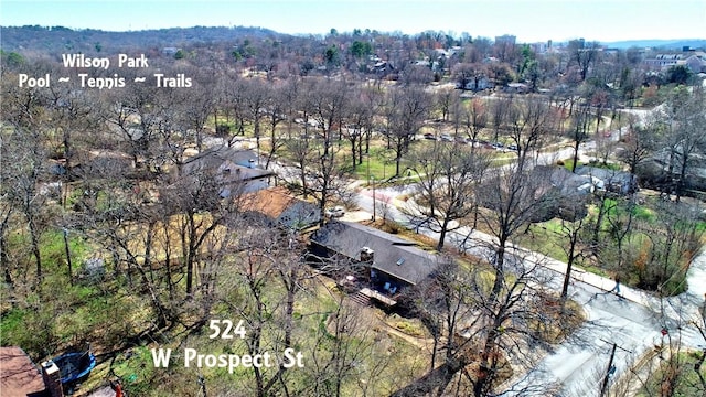 aerial view featuring a view of trees