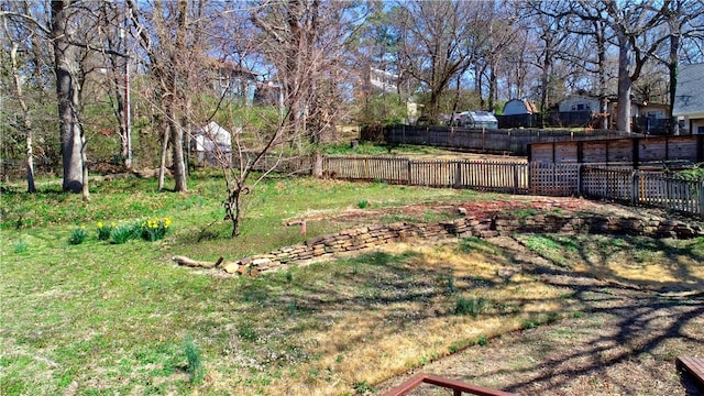 view of yard with fence