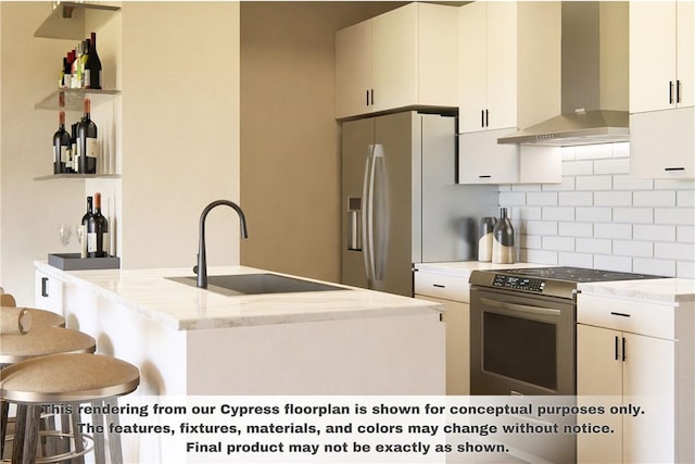 kitchen featuring a breakfast bar area, stainless steel appliances, tasteful backsplash, a sink, and wall chimney exhaust hood