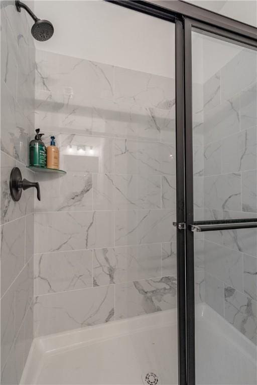 bathroom featuring a stall shower