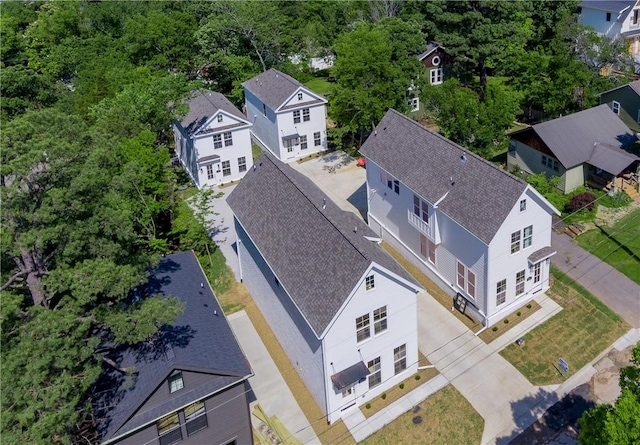 birds eye view of property with a residential view