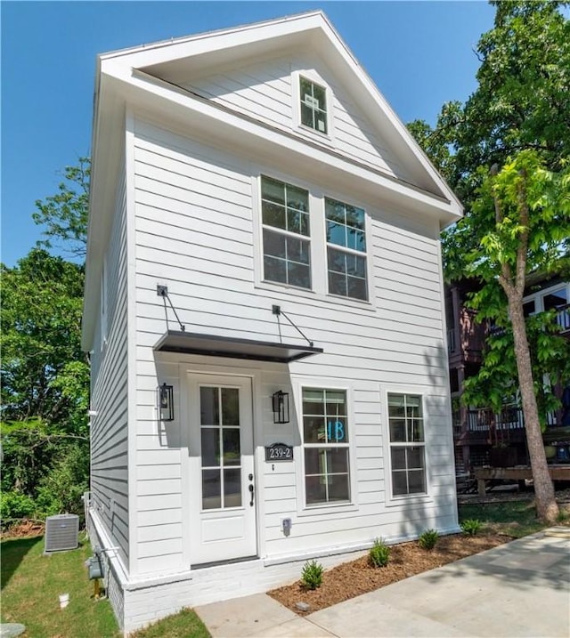 view of front of home with central air condition unit