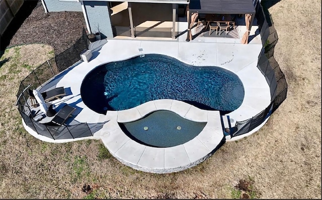 outdoor pool featuring a patio and fence private yard