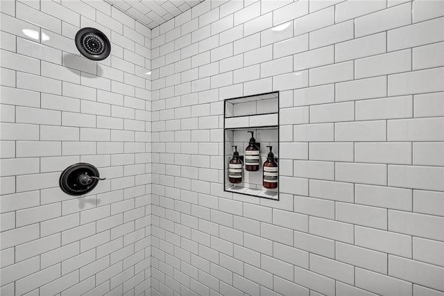 full bathroom with tiled shower