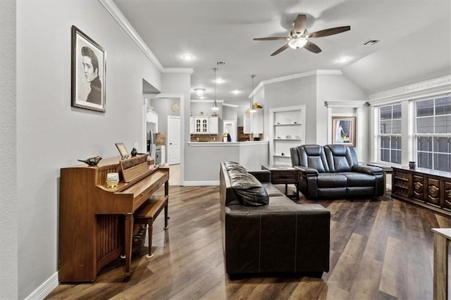 living area with baseboards, visible vents, ceiling fan, ornamental molding, and dark wood-type flooring