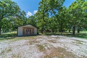 exterior space featuring an outbuilding