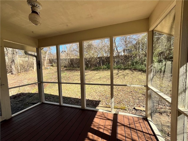 unfurnished sunroom featuring plenty of natural light