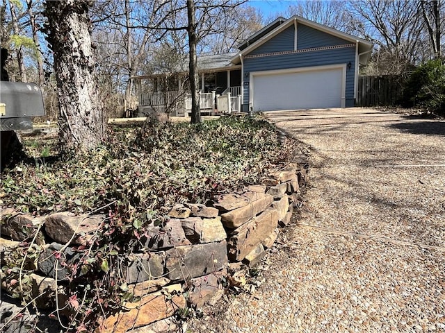 view of front of home with a garage and driveway