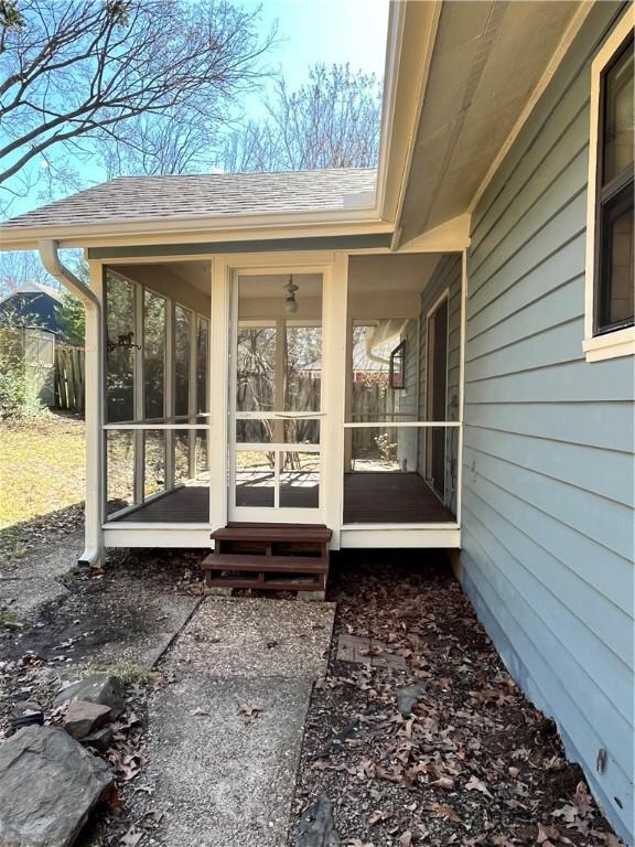 exterior space with a sunroom