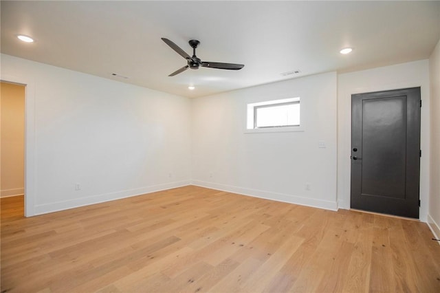 unfurnished room featuring recessed lighting, visible vents, baseboards, and light wood-style flooring