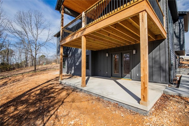 view of patio / terrace featuring a deck and french doors