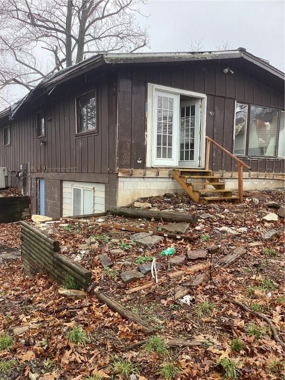 view of home's exterior with entry steps