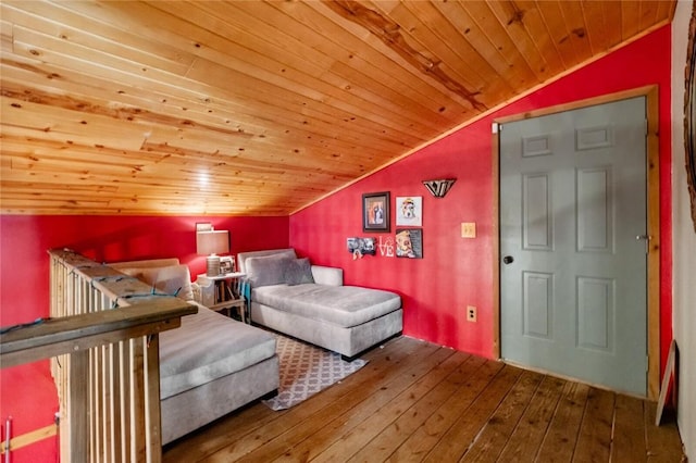 unfurnished bedroom with hardwood / wood-style floors, lofted ceiling, and wooden ceiling