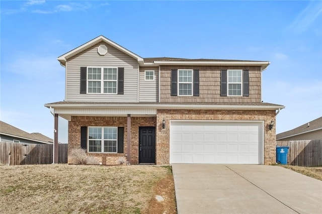 view of front of home featuring brick siding, driveway, fence, and an attached garage