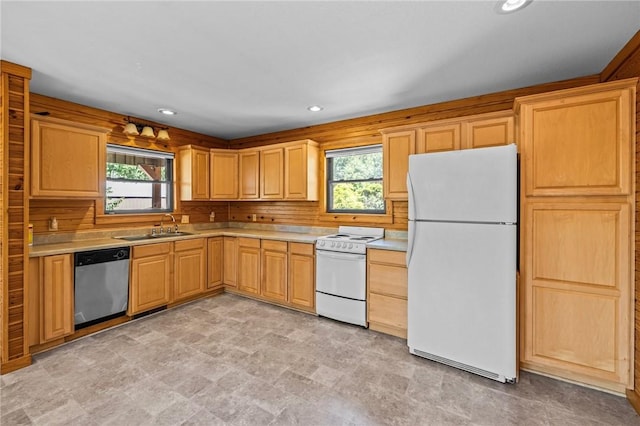 8943 Rambo Rd, Rogers, AR 72756 - kitchen with recessed lighting, white appliances, light countertops, and a sink