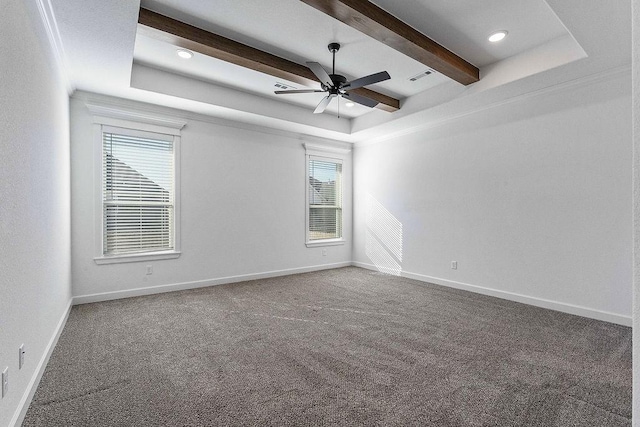 empty room featuring baseboards, a raised ceiling, beamed ceiling, and carpet flooring