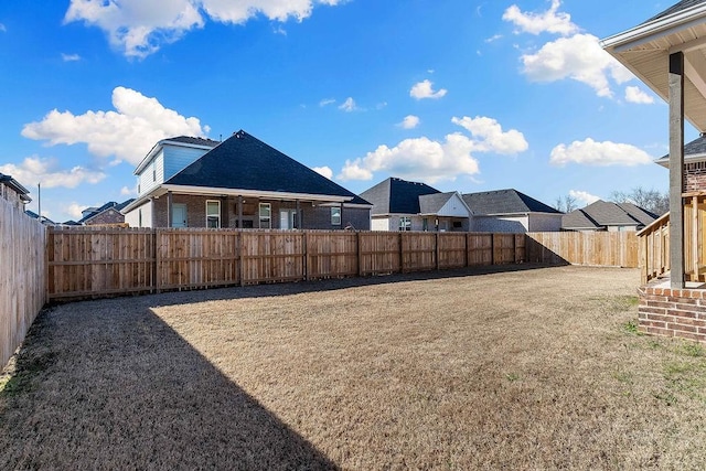 view of yard featuring a fenced backyard