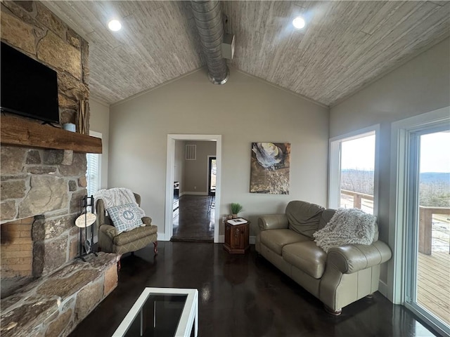 living room with lofted ceiling, wood finished floors, wood ceiling, and baseboards