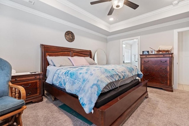 bedroom with a raised ceiling, a ceiling fan, light colored carpet, ornamental molding, and recessed lighting