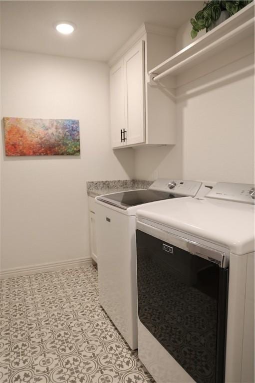 laundry room featuring independent washer and dryer, recessed lighting, cabinet space, light tile patterned flooring, and baseboards