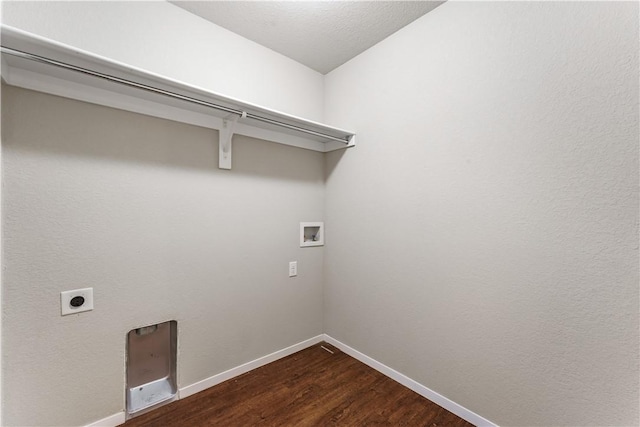 washroom featuring dark wood-type flooring, baseboards, laundry area, hookup for a washing machine, and hookup for an electric dryer