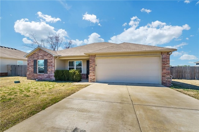 single story home featuring a front lawn, an attached garage, brick siding, and driveway