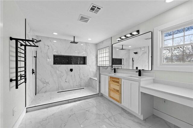 bathroom with a marble finish shower, visible vents, and marble finish floor