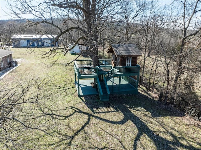 view of yard with a wooden deck