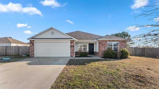 single story home with brick siding, an attached garage, driveway, and fence