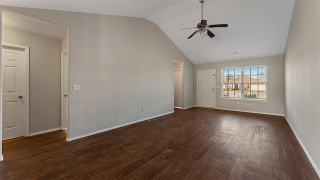 empty room featuring dark wood-style floors, high vaulted ceiling, baseboards, and ceiling fan