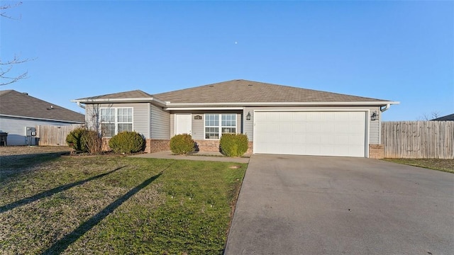 single story home featuring a garage, brick siding, driveway, and fence