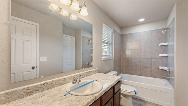 full bath featuring tile patterned flooring, visible vents, toilet, shower / bathing tub combination, and vanity