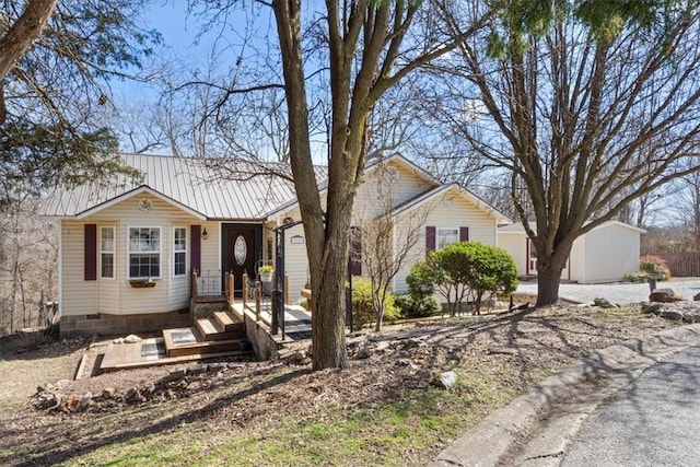 single story home featuring crawl space and metal roof