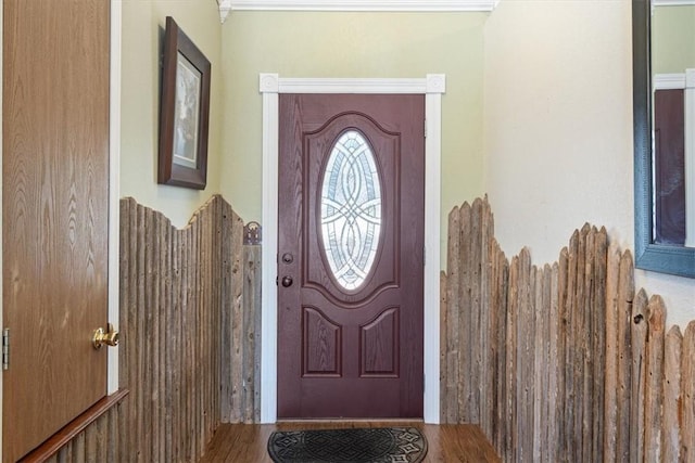 entryway with wood finished floors