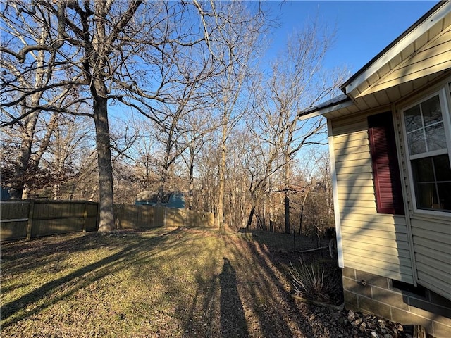 view of yard with fence