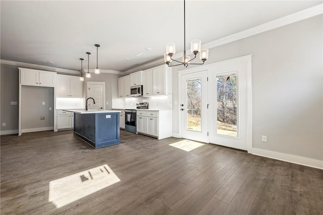 kitchen with white cabinets, appliances with stainless steel finishes, crown molding, and dark wood-type flooring