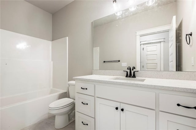 bathroom with shower / bathing tub combination, toilet, and vanity