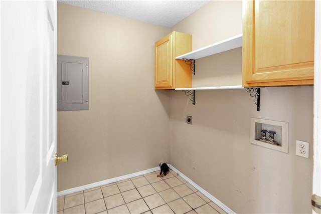 laundry area featuring light tile patterned floors, hookup for an electric dryer, electric panel, cabinet space, and washer hookup