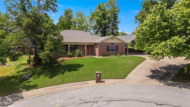 5530 Blake Ln, Springdale, AR 72762 - ranch-style home with driveway, brick siding, and a front yard