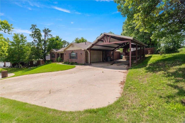 5530 Blake Ln, Springdale, AR 72762 - view of front of property with concrete driveway, brick siding, an attached carport, and an attached garage